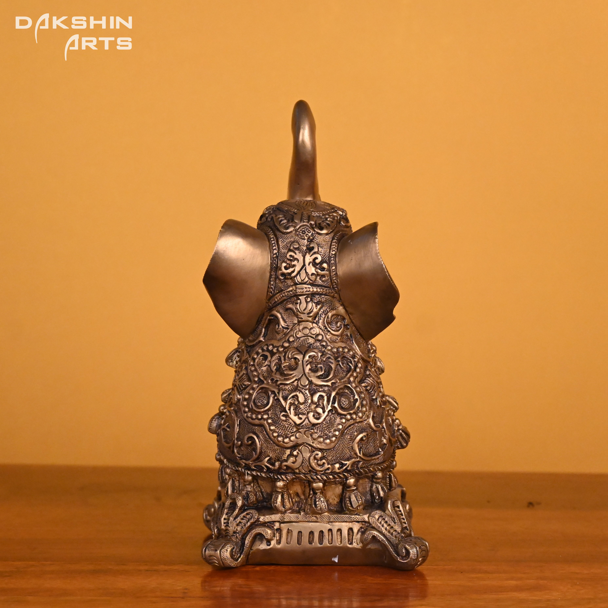 BABY ELEPHANT SITTING - Dakshin Arts