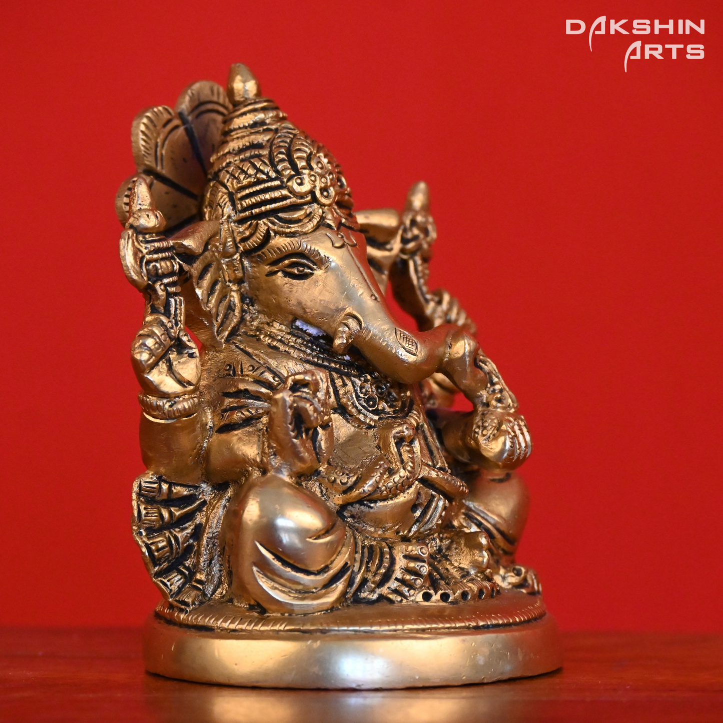 GANESH SITTING ON ROUND BASE - Dakshin Arts