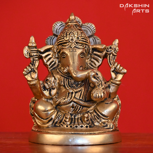 GANESH SITTING ON ROUND BASE - Dakshin Arts