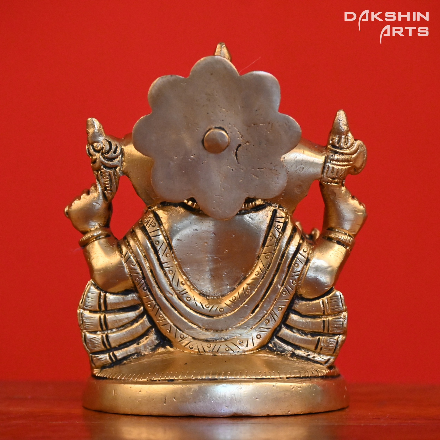 GANESH SITTING ON ROUND BASE