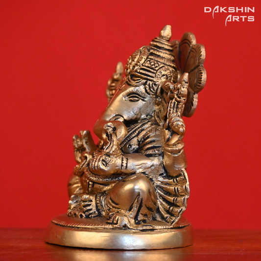 GANESH SITTING ON ROUND BASE - Dakshin Arts