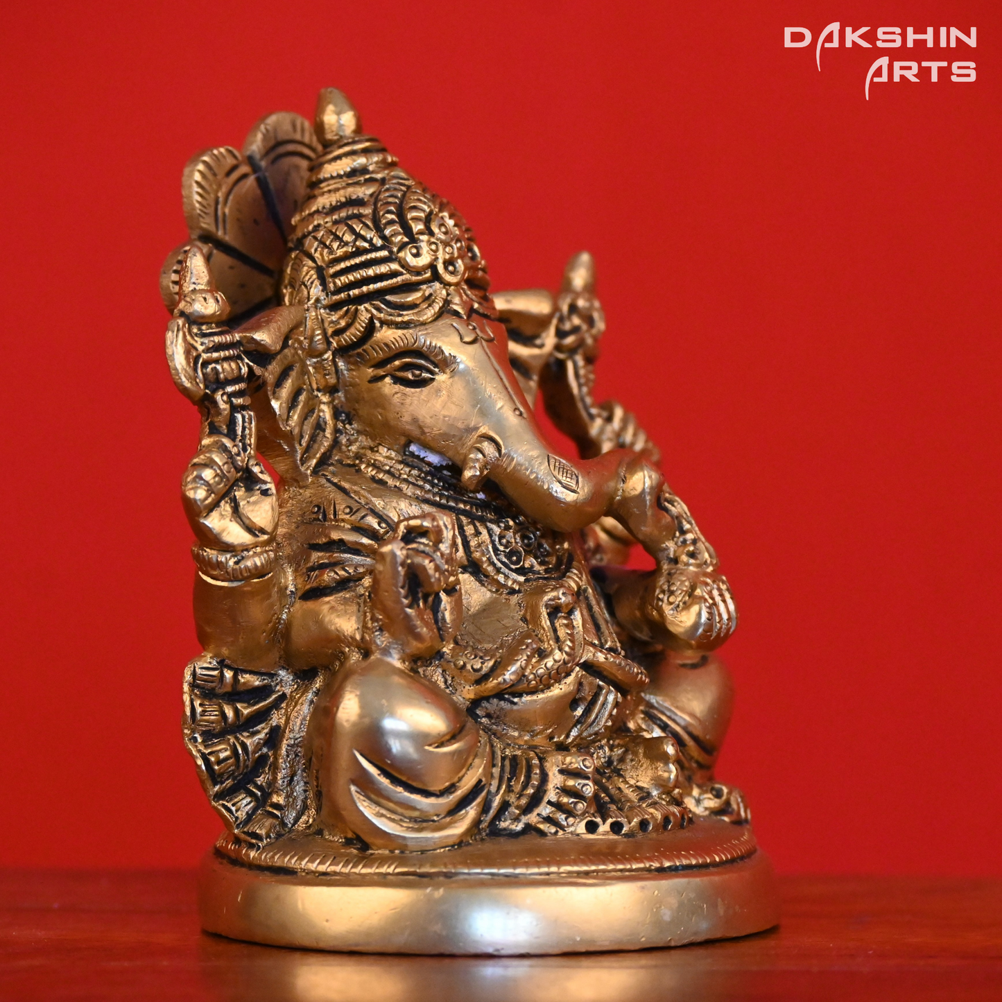 GANESH SITTING ON ROUND BASE